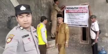 Kepenghuluan Sungai Nyamuk Sungai Pasang Spanduk Peringatan Keras