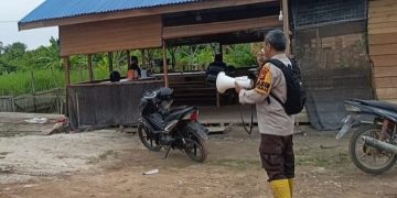 Langkah Preventif Karhutla Polsek Sinaboi Sosialisasikan Imbauan Lewat TOA